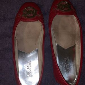 Michael Kor’s  flats